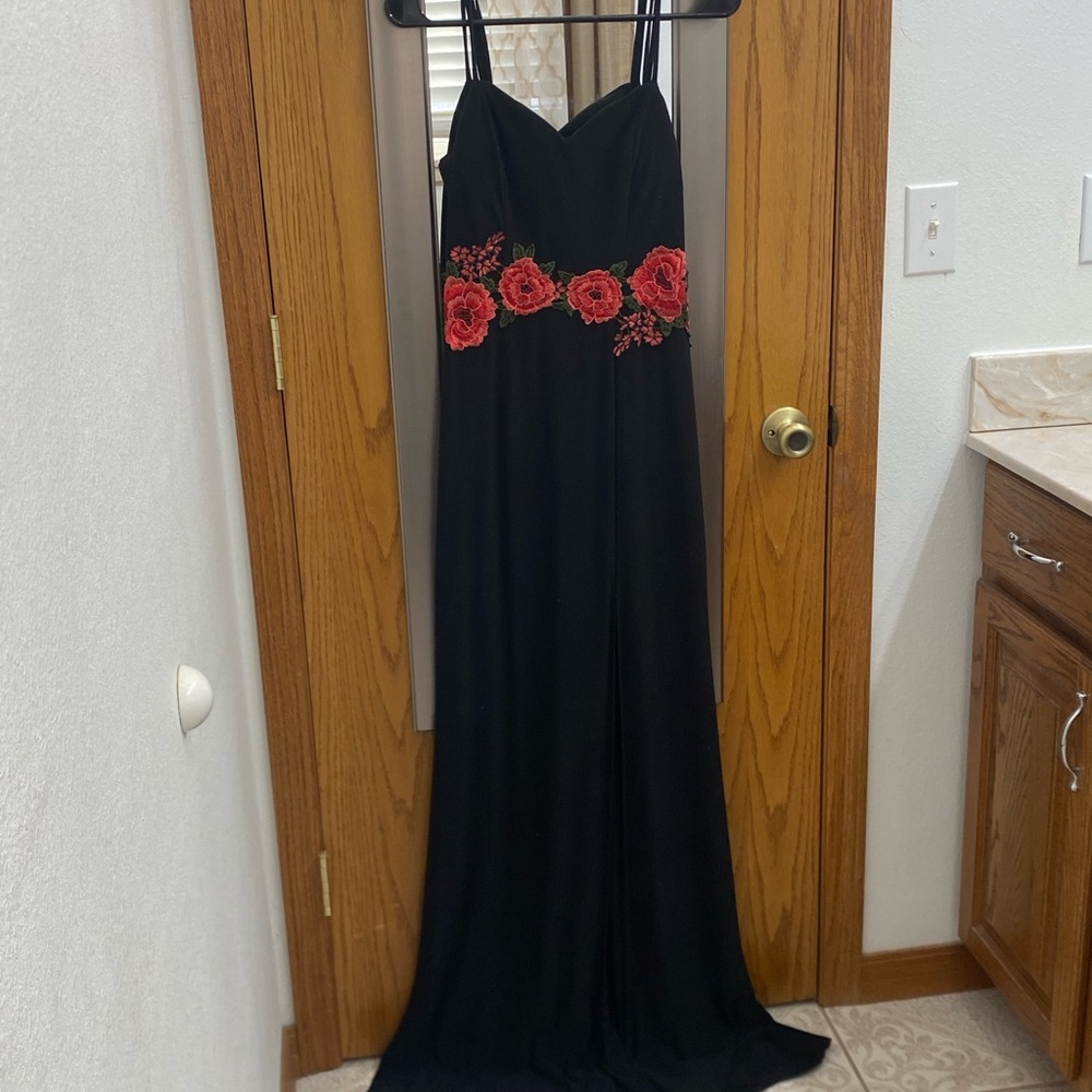 Elegant Black Dress with Red Floral Accents